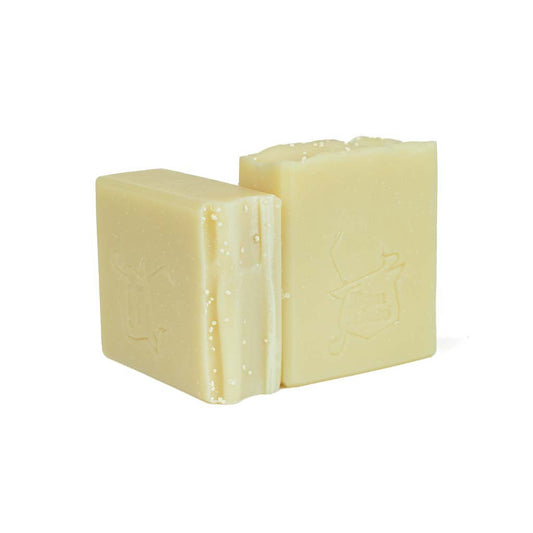 Don Gato natural soap bar with peppermint scent, light ivory hue, on white background.
