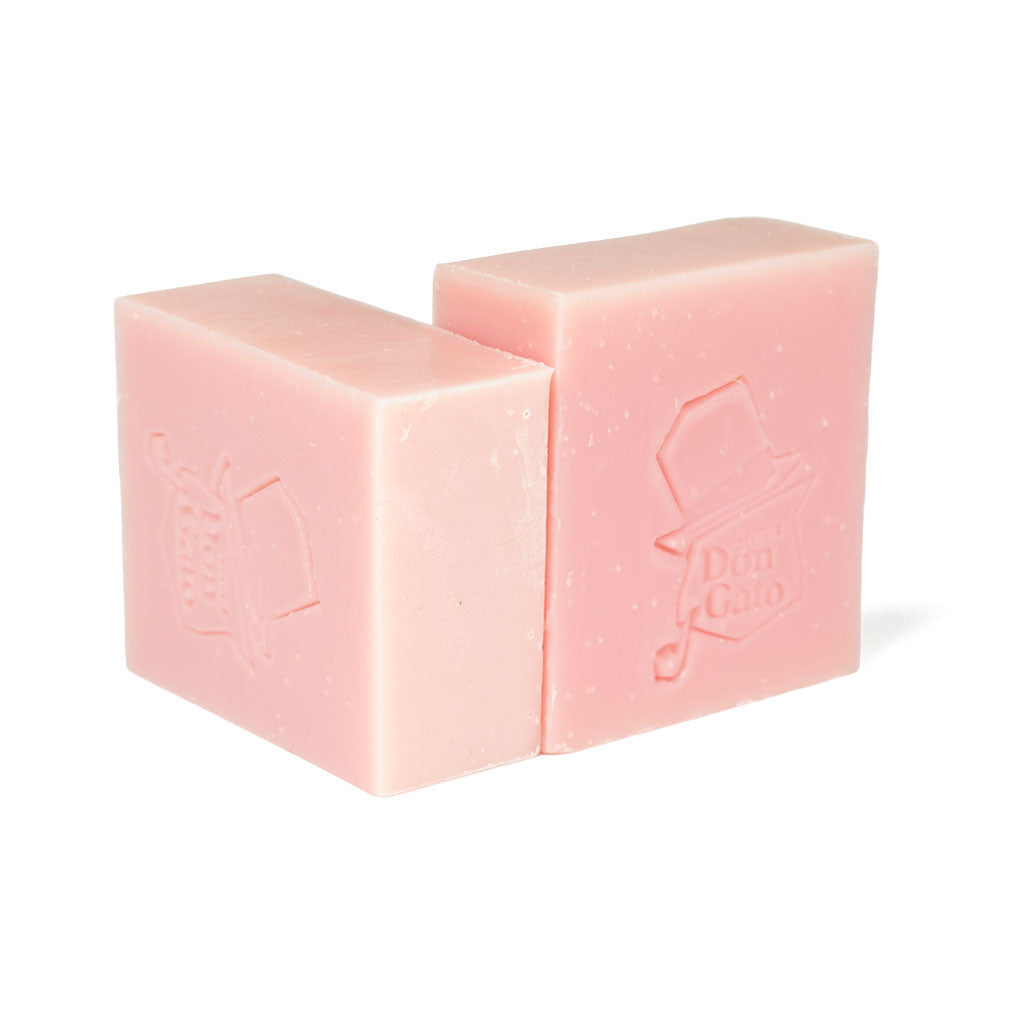 Two light pink Don Gato Soft Rose soap bars with embossed logos in bright natural light.